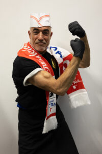 Chef Abou Adal flexing